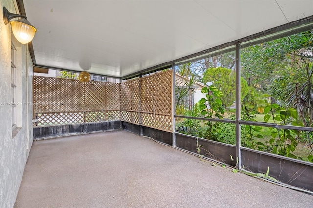 unfurnished sunroom with a wealth of natural light