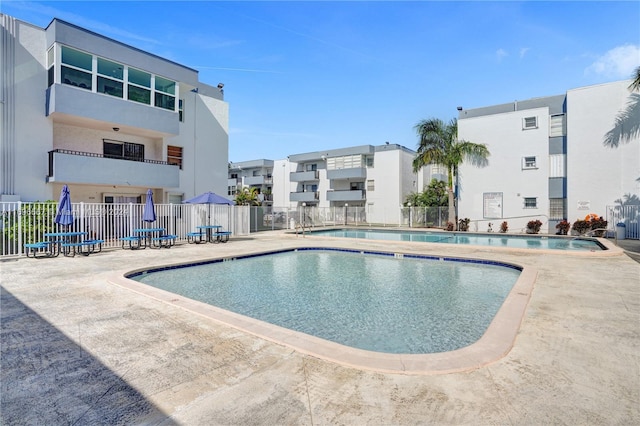 view of pool featuring a patio area