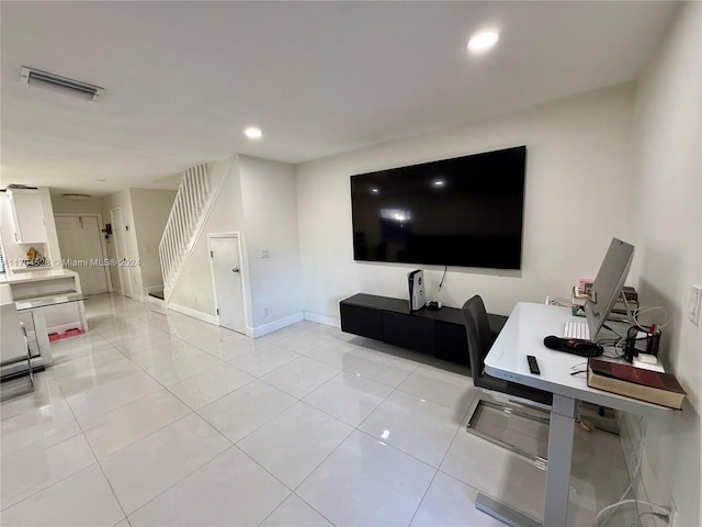 living room with light tile patterned floors