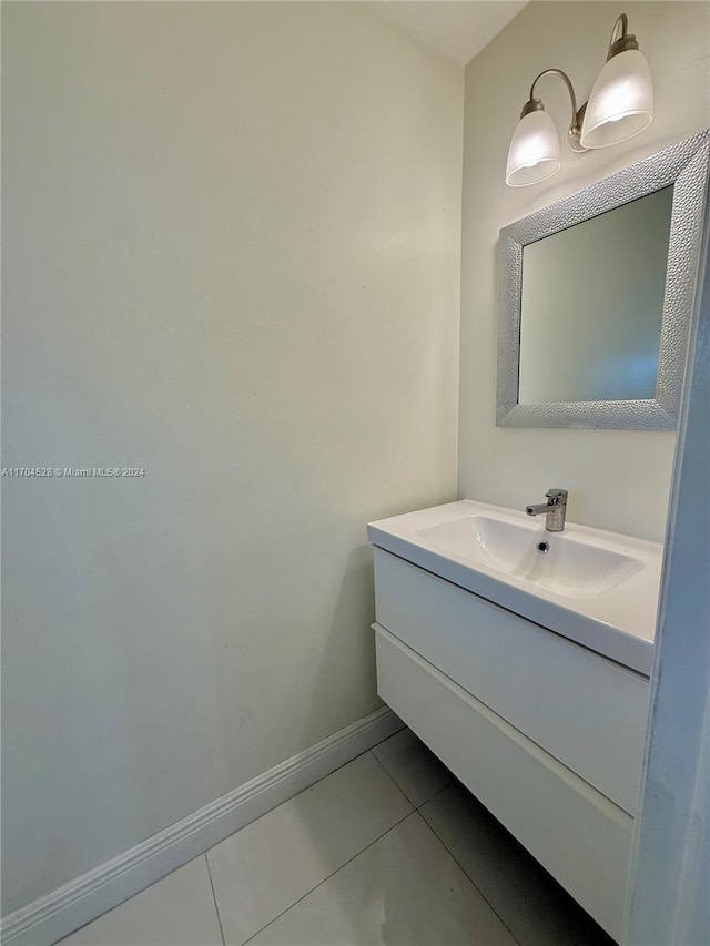 bathroom featuring tile patterned floors and vanity