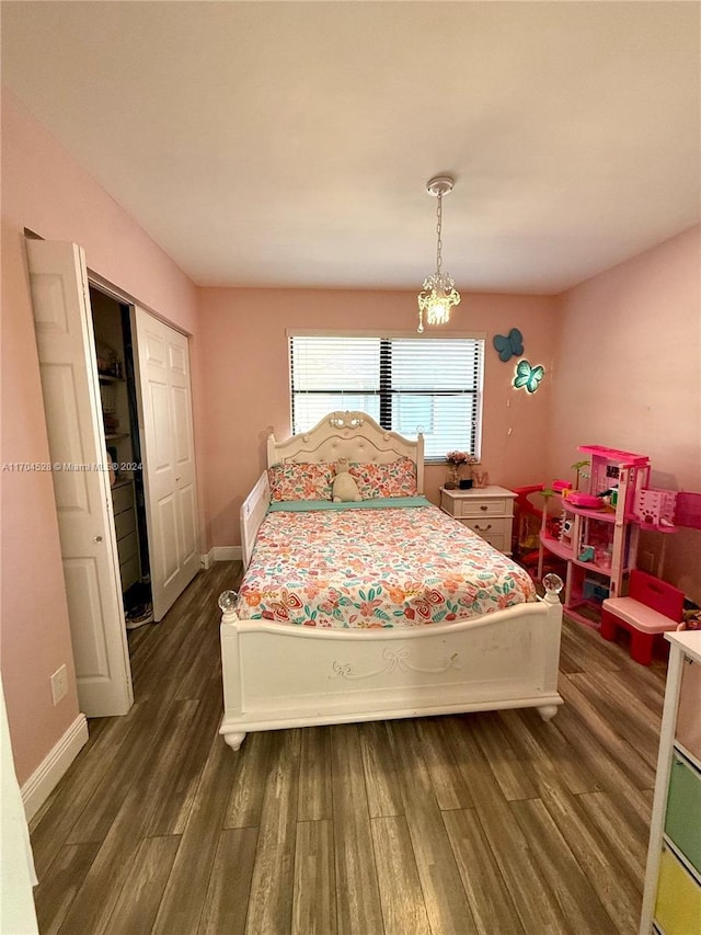 bedroom featuring a closet and dark hardwood / wood-style flooring