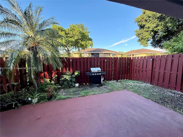 view of patio with a grill