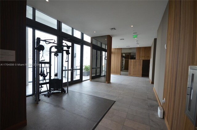 239 SW 9th St Unit 1603, Miami, FL 33130 - community lobby with a wall of windows