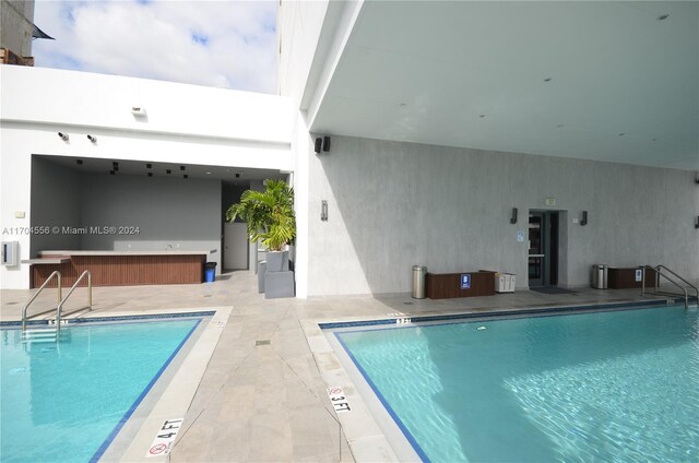 239 SW 9th St Unit 1603, Miami, FL 33130 - indoor pool featuring a patio