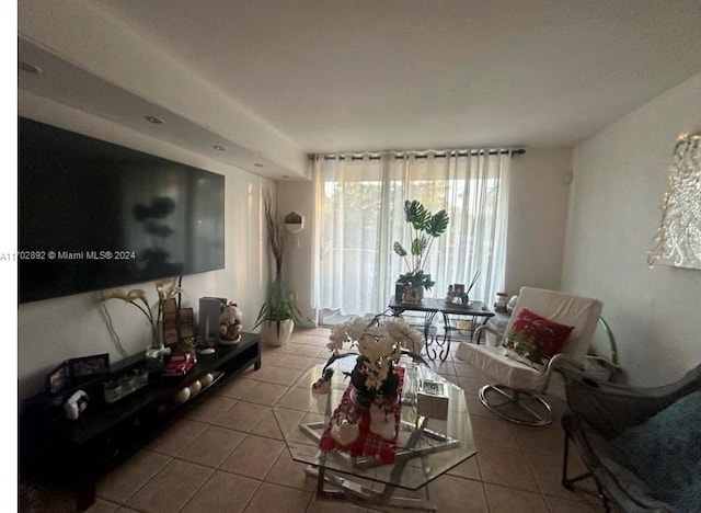 living room with tile patterned floors