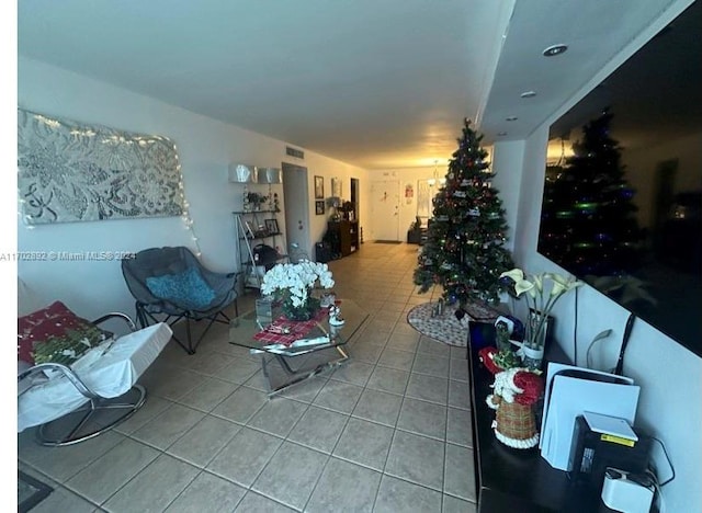 living room with tile patterned flooring