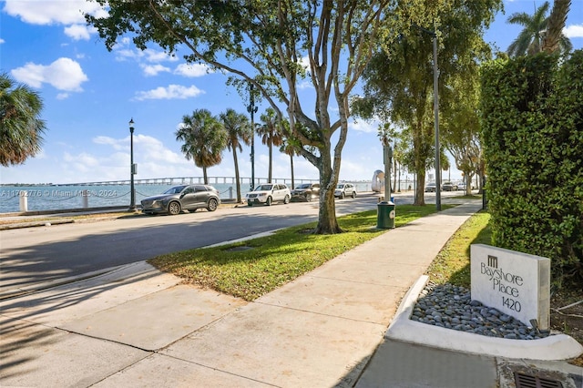 view of community with a water view