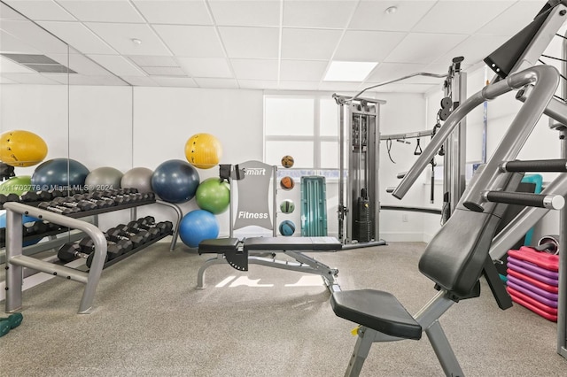 exercise room with a drop ceiling