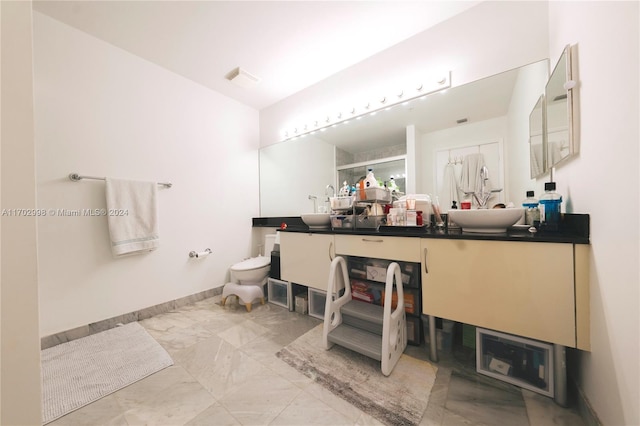 bathroom with vanity and a shower with door