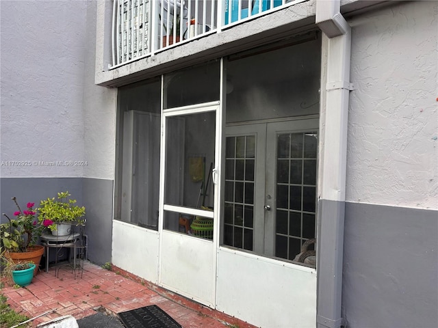 doorway to property with french doors