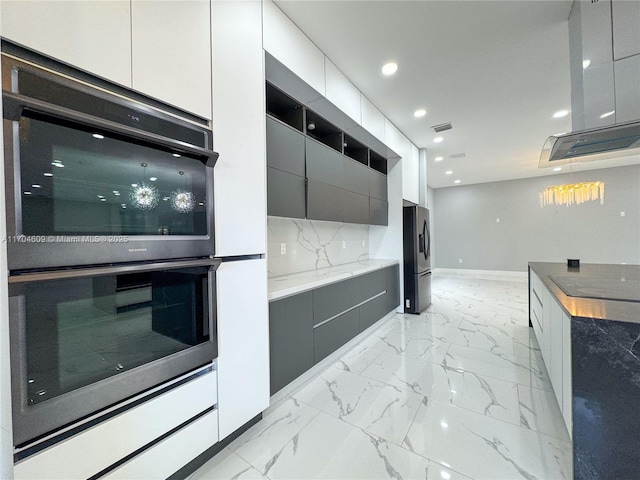 19363 SW 79th Ave, Cutler Bay, FL 33157 - kitchen featuring marble finish floor, modern cabinets, multiple ovens, recessed lighting, and stainless steel fridge