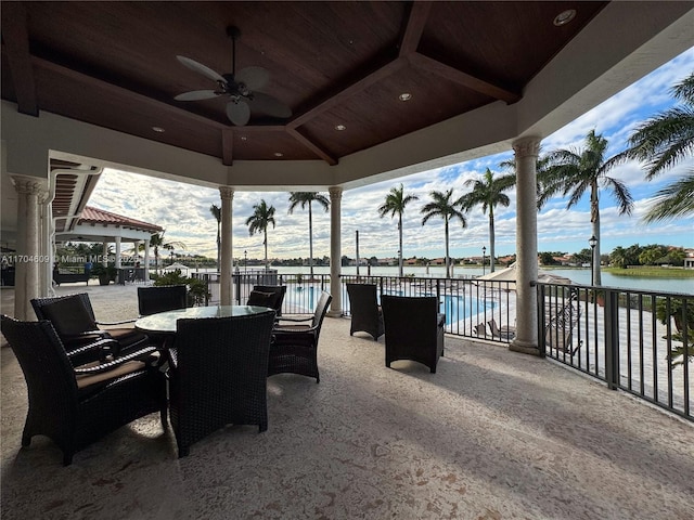 19363 SW 79th Ave, Cutler Bay, FL 33157 - view of patio / terrace with a water view, a ceiling fan, and outdoor dining space