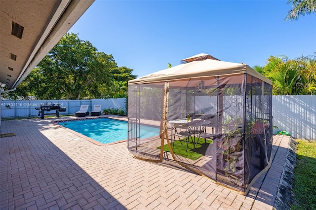 view of pool with a gazebo and a patio area