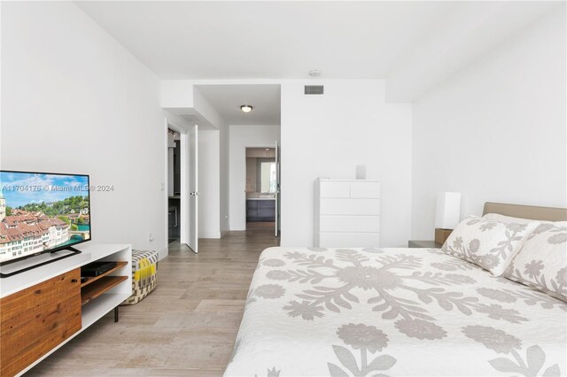 bedroom featuring light hardwood / wood-style floors