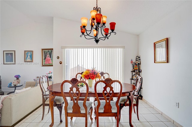 tiled dining space with an inviting chandelier and lofted ceiling