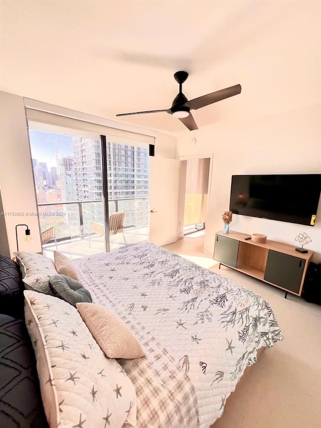 bedroom featuring ceiling fan and access to outside