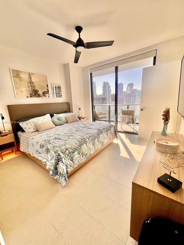 bedroom featuring access to outside and ceiling fan