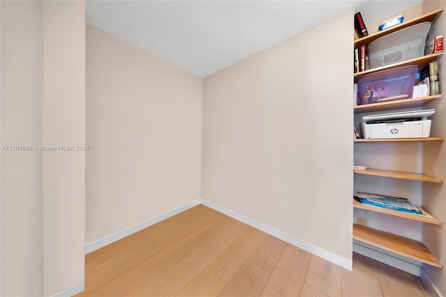 empty room featuring wood-type flooring