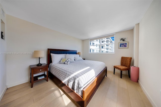 bedroom with light wood-type flooring