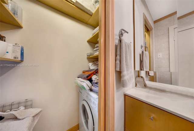 laundry area with washer / dryer