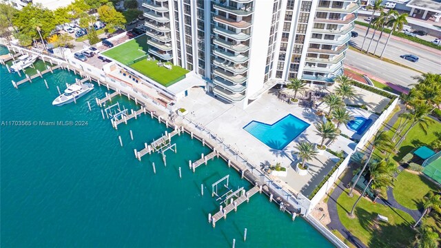 birds eye view of property featuring a water view