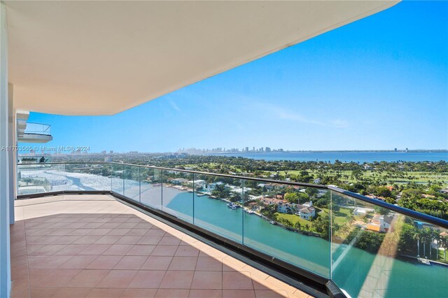 balcony featuring a water view