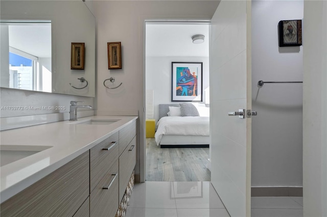 bathroom featuring tile patterned floors and vanity