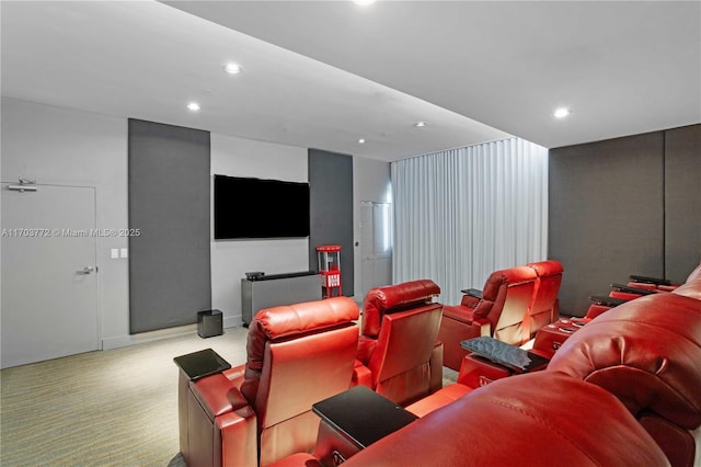 home theater room with light colored carpet