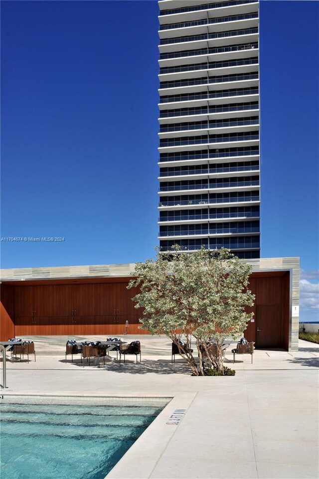 view of pool with a patio