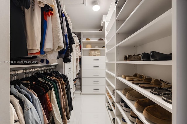 walk in closet featuring light tile patterned floors