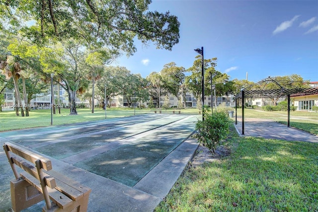 view of home's community with a lawn and a gazebo