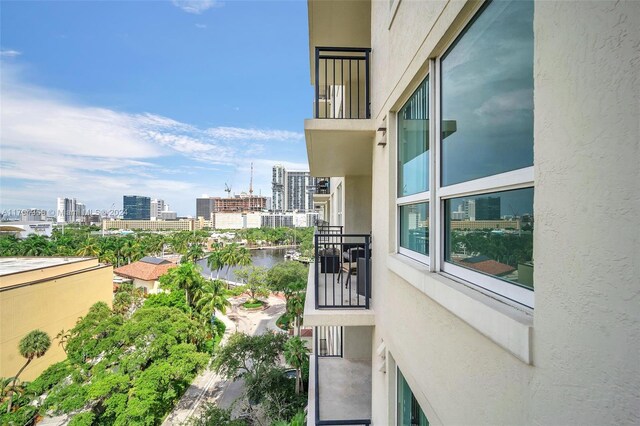 balcony featuring a water view