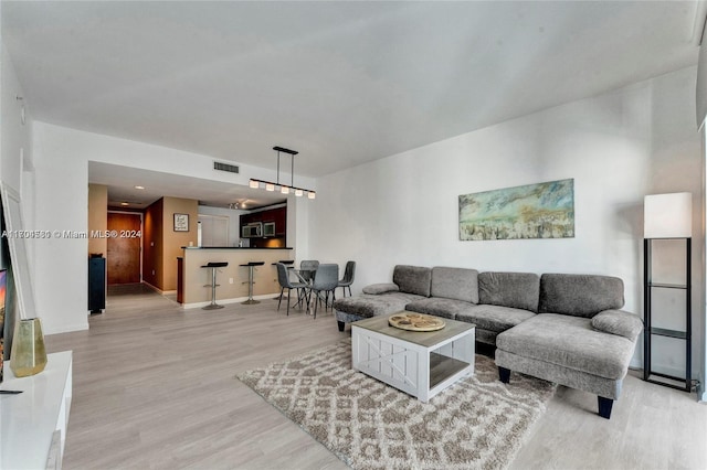 living room featuring light hardwood / wood-style flooring