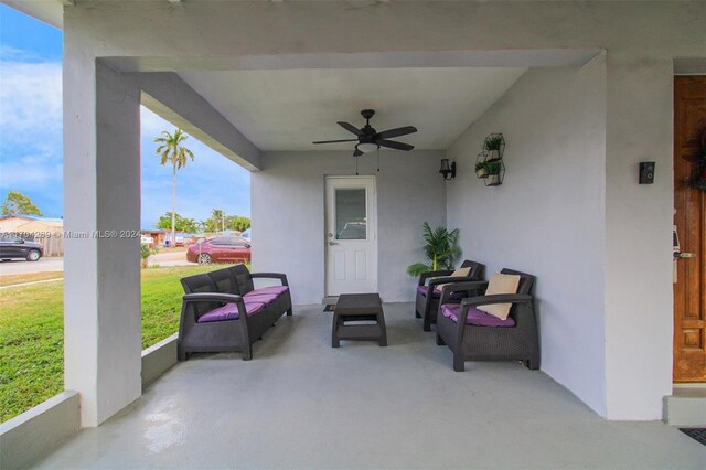 view of patio featuring ceiling fan