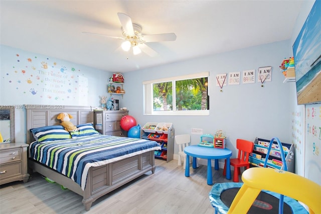 bedroom featuring ceiling fan and light hardwood / wood-style floors