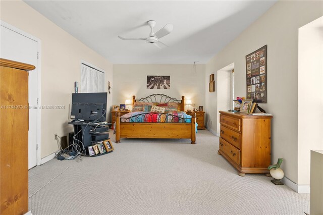 carpeted bedroom featuring ceiling fan