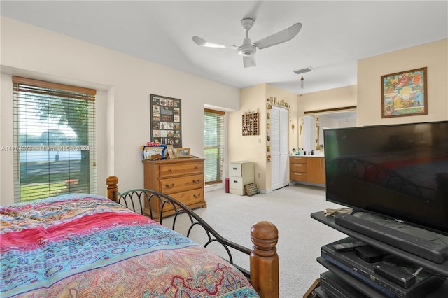 carpeted bedroom with ceiling fan