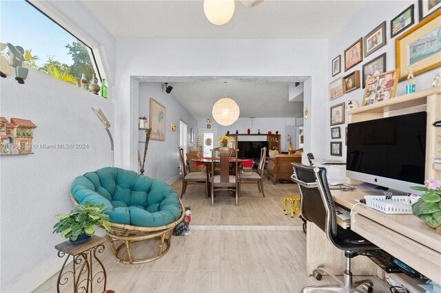 home office with light wood-type flooring