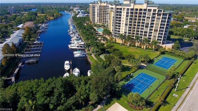 birds eye view of property with a water view