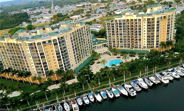 birds eye view of property featuring a water view