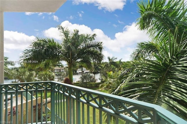 balcony featuring a water view