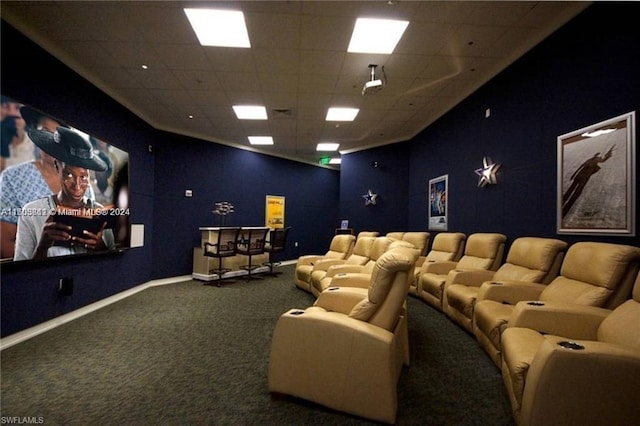 home theater room with carpet flooring