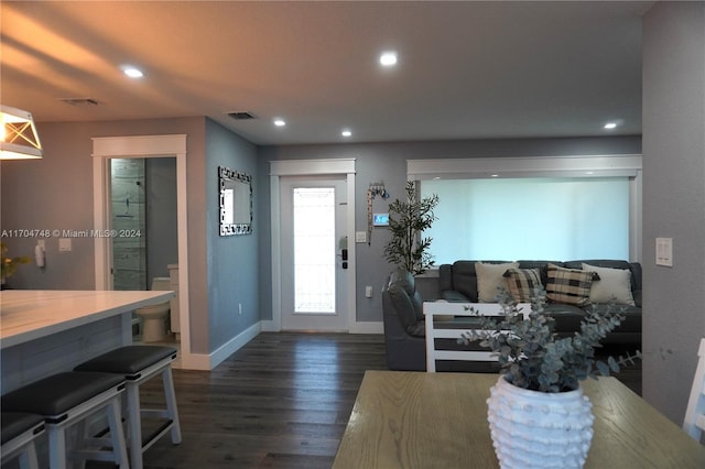 interior space with dark hardwood / wood-style floors