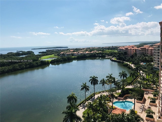 drone / aerial view with a water view