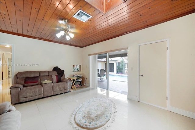 tiled living room featuring ceiling fan, crown molding, and wood ceiling