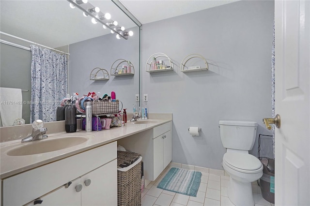 bathroom with vanity, tile patterned floors, toilet, and a shower with shower curtain