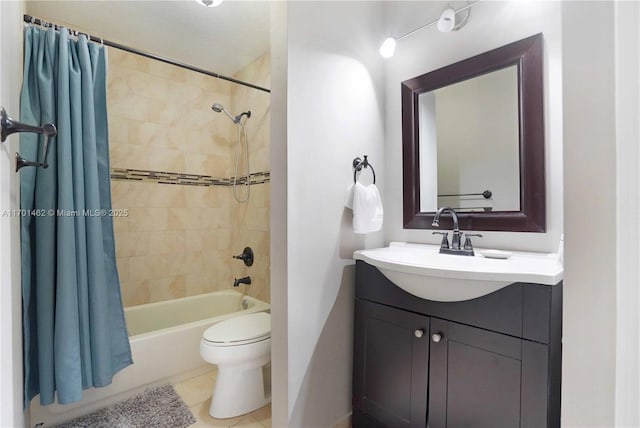 full bathroom with vanity, tile patterned floors, shower / bath combination with curtain, and toilet