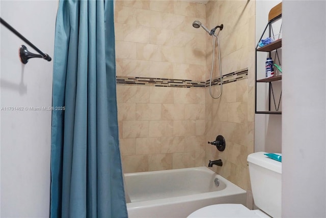 bathroom with shower / bath combination with curtain and toilet