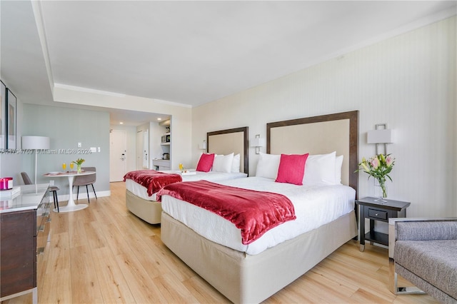 bedroom with light hardwood / wood-style floors