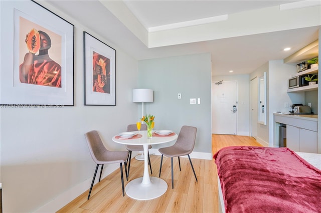 dining space featuring light hardwood / wood-style floors